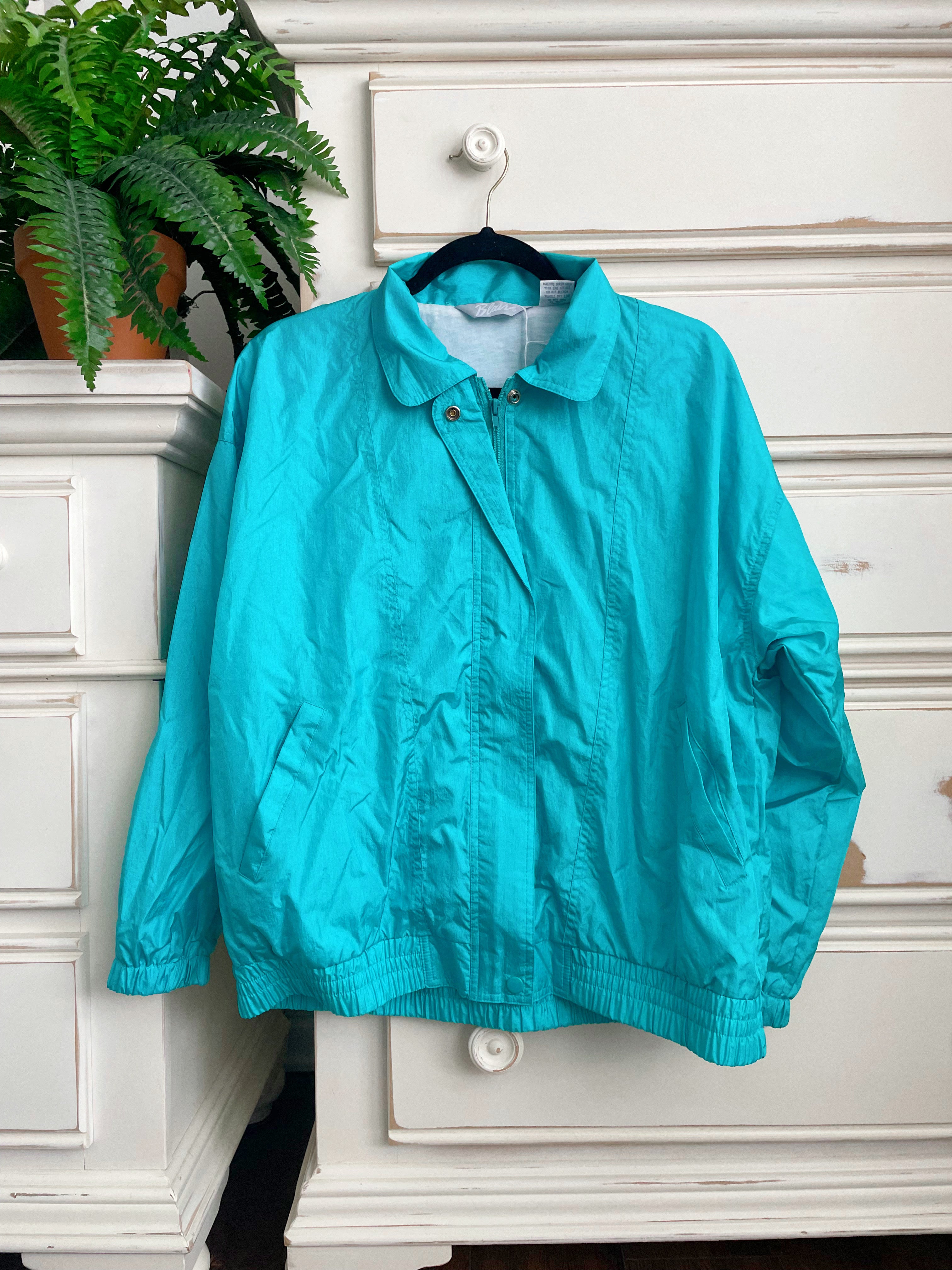 Teal windbreaker on sale